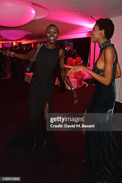 Alek Wek and guest dance at the de Grisogono party during the 69th Cannes Film Festival at Hotel du Cap-Eden-Roc on May 17, 2016 in Cap d'Antibes,...