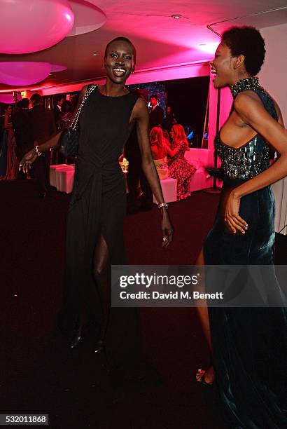 Alek Wek and guest dance at the de Grisogono party during the 69th Cannes Film Festival at Hotel du Cap-Eden-Roc on May 17, 2016 in Cap d'Antibes,...