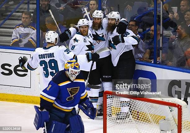 Brent Burns of the San Jose Sharks celebrates with Joe Thornton, Joe Pavelski, and Logan Couture after scoring a second period goal against Brian...