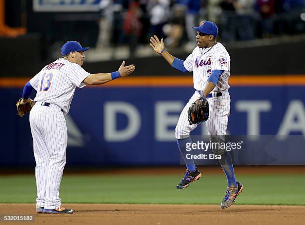 Asdrubal Cabrera and Curtis Granderson of the New York Mets celebrate the 2-0 win over the Washington Nationals at Citi Field on May 17, 2016 in the...