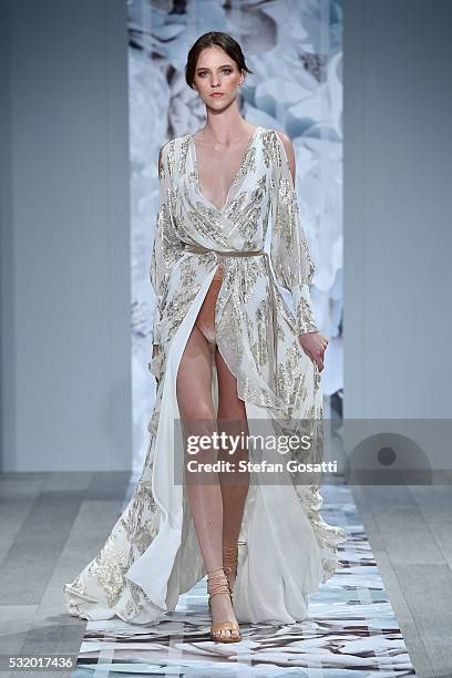 Model walks the runway during the We Are Kindred show at Mercedes-Benz Fashion Week Resort 17 Collections at Carriageworks on May 18, 2016 in Sydney,...