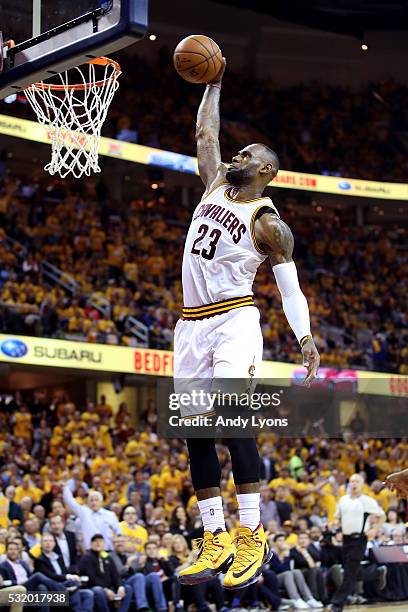 LeBron James of the Cleveland Cavaliers goes up for a dunk in the third quarter against the Toronto Raptors in game one of the Eastern Conference...