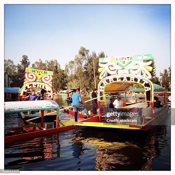 trajinera boats in xochimilco, mexico city - trajinera stock pictures, royalty-free photos & images