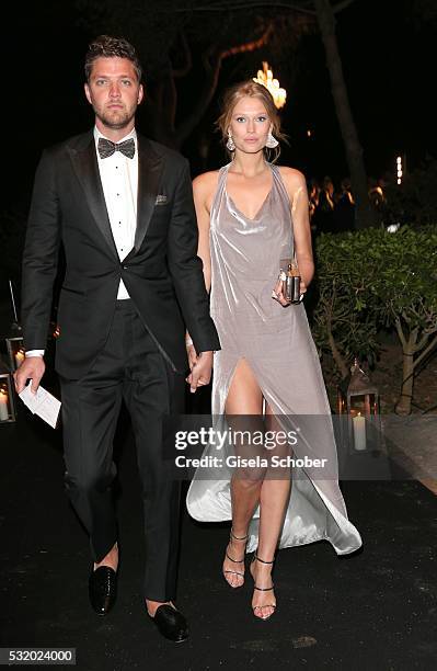 Toni Garrn and her boyfriend Chandler Parson during the 'De Grisogono' Party at the annual 69th Cannes Film Festival at Hotel du Cap-Eden-Roc on May...