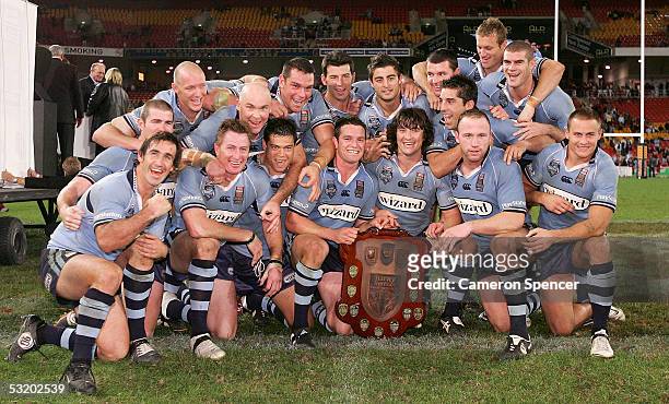 The Blues celebrate winning game three of the ARL State of Origin series between the Queensland Maroons and the New South Wales Blues at Suncorp...
