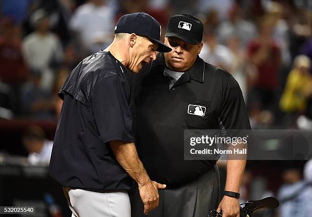 Manager Joe Girardi of the New York Yankees argues with home plate umpire Fieldin Culbreth after Brett Gardner was called out on strikes against the...