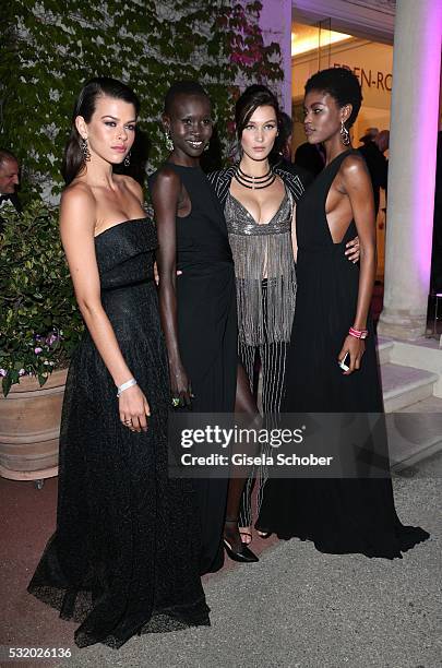 Model Alek Wek and Bella Hadid during the 'De Grisogono' Party at the annual 69th Cannes Film Festival at Hotel du Cap-Eden-Roc on May 17, 2016 in...