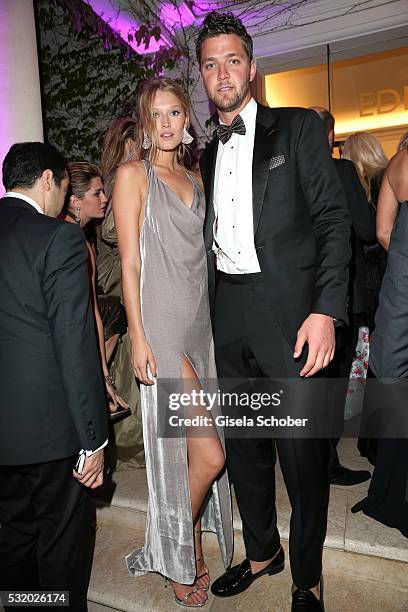 Toni Garrn and her boyfriend Chandler Parson during the 'De Grisogono' Party at the annual 69th Cannes Film Festival at Hotel du Cap-Eden-Roc on May...