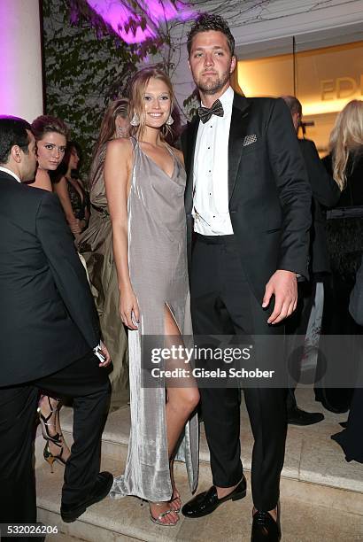 Toni Garrn and her boyfriend Chandler Parson during the 'De Grisogono' Party at the annual 69th Cannes Film Festival at Hotel du Cap-Eden-Roc on May...