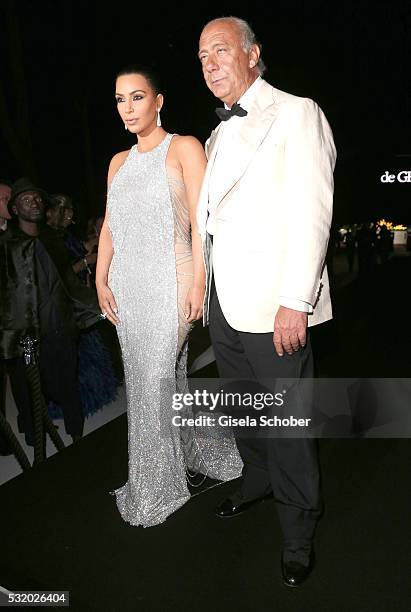 Kim Kardashian and host Fawaz Gruosi during the 'De Grisogono' Party at the annual 69th Cannes Film Festival at Hotel du Cap-Eden-Roc on May 17, 2016...