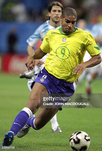 Germany: Brazil's forward Adriano sprints with the ball during the 2005 FIFA Confederations Cup football final Brazil vs Argentina at the Waldstadion...