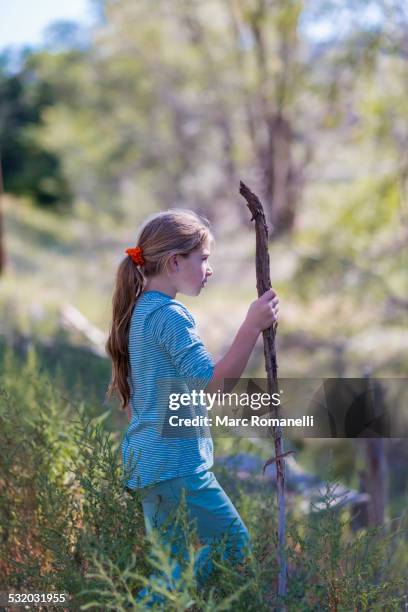 Staching Rular Girl Caucasian Girl Walking In Rural Grassy Field Photo - Getty Images