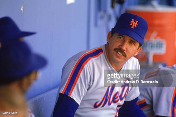 Manager Davey Johnson of the New York Mets sit on the dugout during a season game. Davey Johnson managed the New York Mets from 1984-1990.
