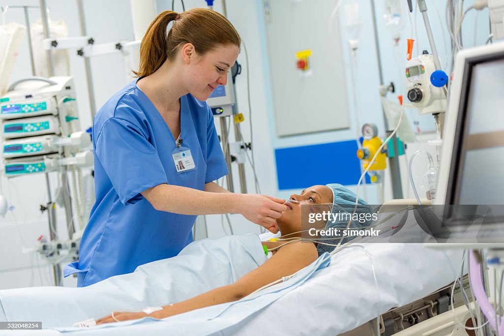 Caring Pacients Nurse Caring Patient High-Res Stock Photo - Getty Images