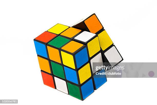 rubiks cube - puzzle cube stock pictures, royalty-free photos & images