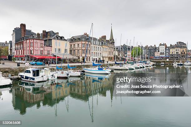 view on the harbour and the beautiful old houses of the town of honfleur, france. - joas souza ストックフォトと画像