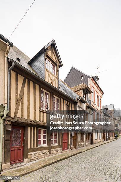 view of the shops and beautiful old houses of the town of honfleur, france. - joas souza bildbanksfoton och bilder