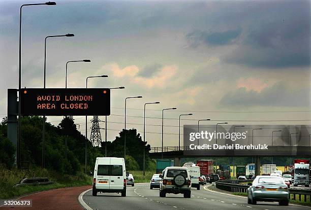 South bound traffic passes a sign on the M6 motorway advising them that London is best avoided following a series of explosions, July 2005 in...