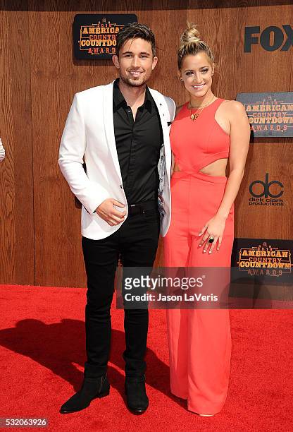 Singer Michael Ray and Carli Manchaca attend the 2016 American Country Countdown Awards at The Forum on May 01, 2016 in Inglewood, California.