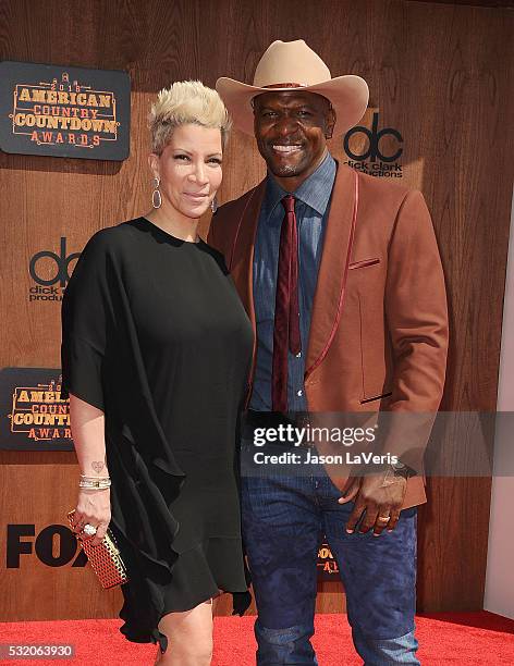 Actor Terry Crews and wife Rebecca King-Crews attend the 2016 American Country Countdown Awards at The Forum on May 01, 2016 in Inglewood, California.