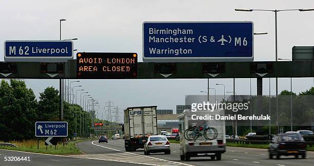 South bound traffic passes a sign on the M6 motorway advising them that London is best avoided following a series of explosions, July 2005 in...