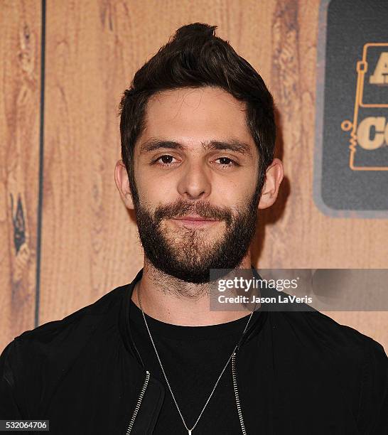 Singer Thomas Rhett poses in the press room at the 2016 American Country Countdown Awards at The Forum on May 01, 2016 in Inglewood, California.