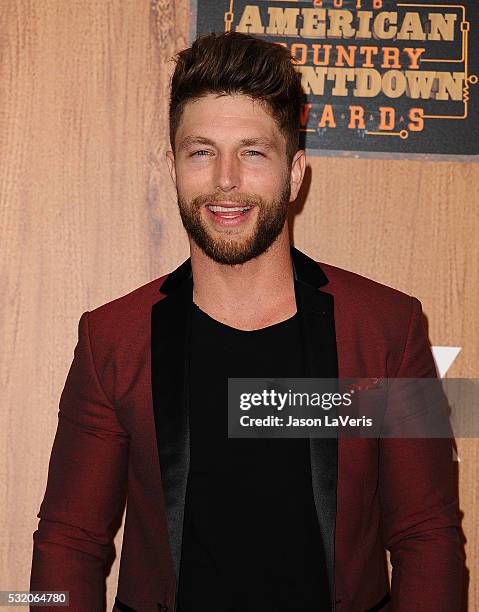 Singer Chris Lane poses in the press room at the 2016 American Country Countdown Awards at The Forum on May 01, 2016 in Inglewood, California.