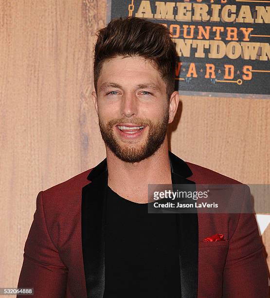 Singer Chris Lane poses in the press room at the 2016 American Country Countdown Awards at The Forum on May 01, 2016 in Inglewood, California.