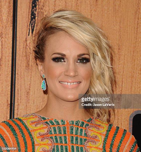 Singer Carrie Underwood poses in the press room at the 2016 American Country Countdown Awards at The Forum on May 01, 2016 in Inglewood, California.