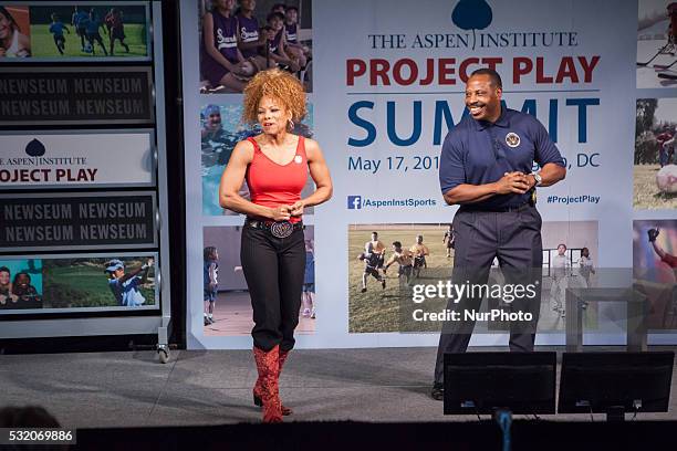 Donna Richardson, Cornell McClellan, Members, President's Council on Fitness, Sports &amp; Nutrition, lead a physical activity break, for the Aspen...