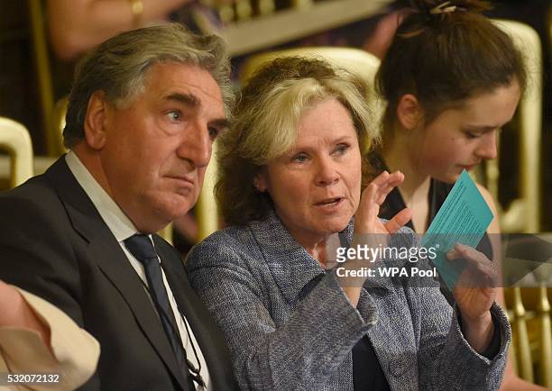 Actors Jim Carter and Imelda Staunton takes their seats ahead of the State Opening of Parliament at the Palace of Westminster at the Houses of...