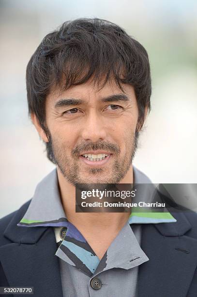 Actor Hiroshi Abe attends the "After The Storm" photocall during the 69th Annual Cannes Film Festival at the Palais des Festivals on May 18, 2016 in...