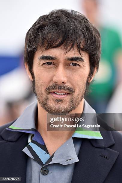 Actor Hiroshi Abe attends the "After The Storm" photocall during the 69th Annual Cannes Film Festival at the Palais des Festivals on May 18, 2016 in...