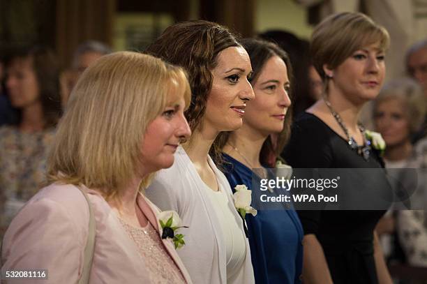 MPs Lisa Cameron, Tasmina Ahmed-Sheikh, Carol Monaghan and Hannah Bardell join MPs as they pass through the Central lobby of the House of Lords for...