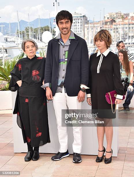 Actors Kirin Kiki, Hiroshi Abe and Yoko Maki attend the "After The Storm" photocall during the 69th Annual Cannes Film Festival at the Palais des...