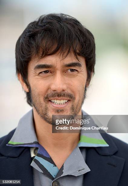Actor Hiroshi Abe attends the "After The Storm" photocall during the 69th Annual Cannes Film Festival at the Palais des Festivals on May 18, 2016 in...