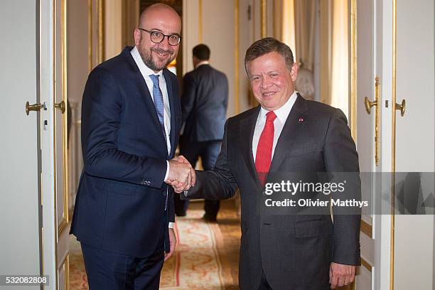 Charles Michel, Prime Minister of Belgium and King Abdullah II of Jordan pose for the official photo at the Royal Palace in Brussels.