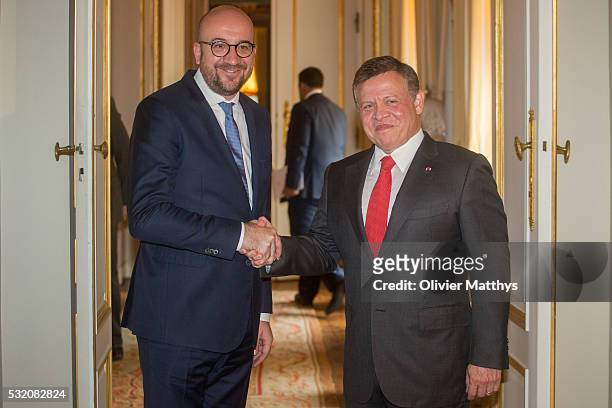 Charles Michel, Prime Minister of Belgium and King Abdullah II of Jordan pose for the official photo at the Royal Palace in Brussels.