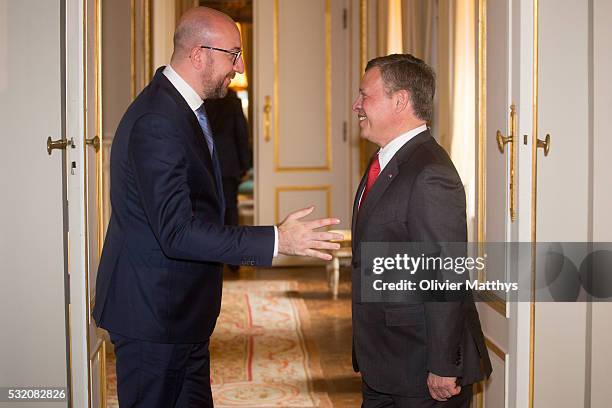 Charles Michel, Prime Minister of Belgium and King Abdullah II of Jordan pose for the official photo at the Royal Palace in Brussels.