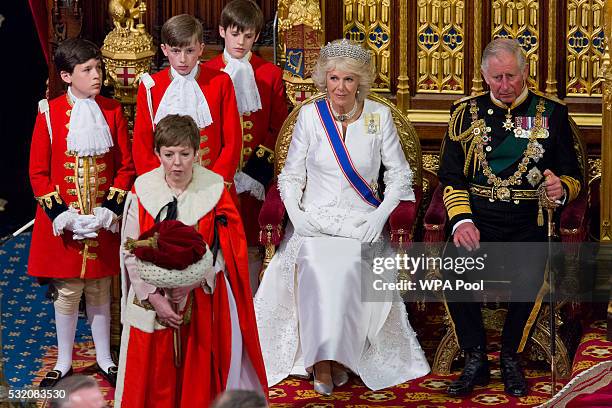 Prince Charles, Prince of Wales and Camilla, Duchess of Cornwall sit as Queen Elizabeth II delivers the Queen's Speech from the throne during State...
