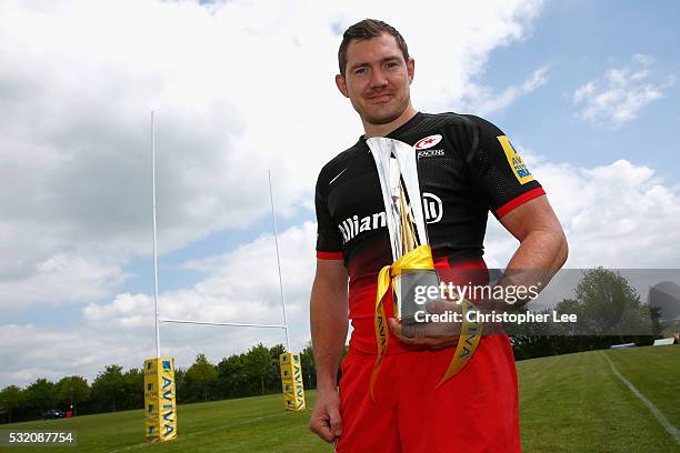 Alex Goode of Saracens and England poses with the Aviva Premiership Player of the Season Trophy on May 17, 2016 in St Albans, England. Goode will be...