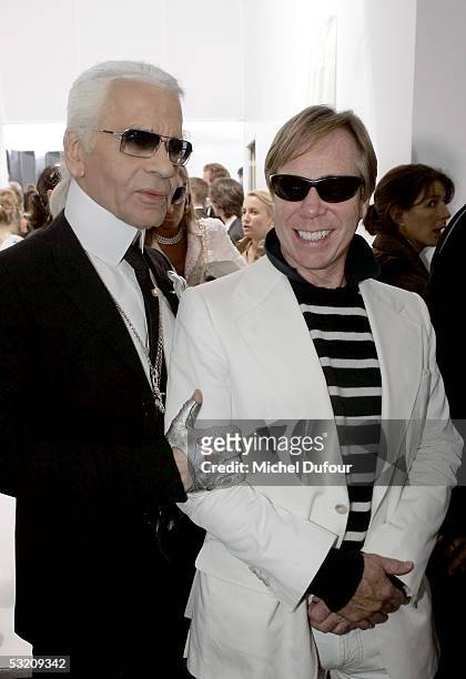 Designers Karl Lagerfeld and Tommy Hilfiger pose at the Chanel Autumn-Winter 2005-06 Collection fashion show, designed by Karl Lagerfeld, on July 7,...