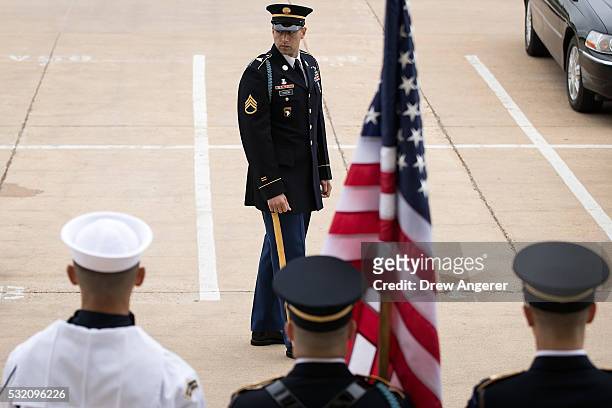 Members of the Honor Guard wait for the arrival of Qatar's Minister of State for Defense Affairs Dr. Khalid bin Mohammed al Attiyah, during an honor...