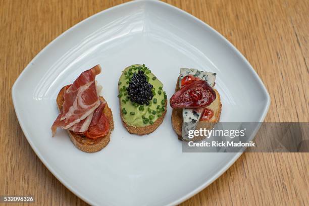 Pinchos from Spainish restaurant Cava, which is celebrating its 10th year in business. Pan Con Tomate with Jamon Serrano , Pincho of Avocado and...