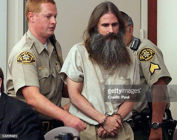 Accused kidnapper Brian David Mitchell is escorted into 3rd District Court of Judge Judith Atherton for his second competency hearing July 7, 2005 in...