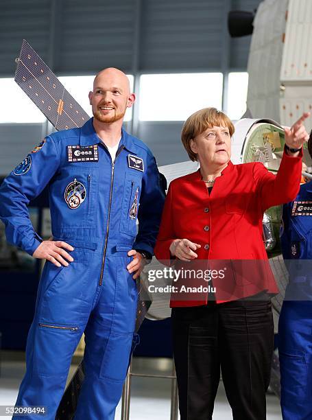 German Chancellor Angela Merkel and German ESA astronaut Alexander Gerst visits the training unit of the Columbus space laboratory at the European...