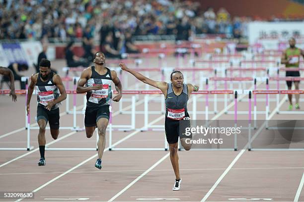 Jason Richardson of the United States, Ronnie Ash of the United States and Aries Merritt of the United States compete in the Men's 110 metres Hurdles...