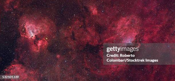 eagle nebula and swan nebula - nebulosa del águila fotografías e imágenes de stock