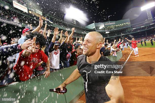 Gabe Kapler of the Boston Red Sox celebrates on the field after the American League Division Series with the Anaheim Angels, Game 3 on October 8,...