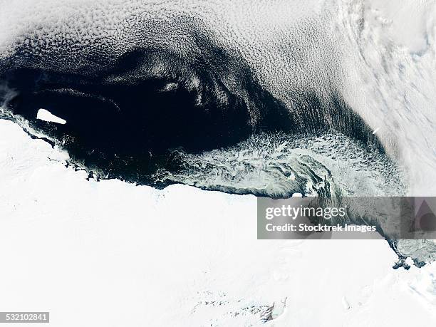 march 15, 2013 - sea ice and icebergs floating along the mawson coast of east antarctica. - ice shelf stock pictures, royalty-free photos & images